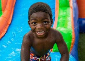 Boy on Water Slide, provided by Jumptastic in Atlanta in GA